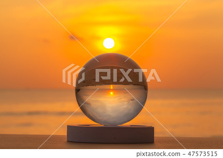 sunset inside the crystal ball on the beach sunset inside the crystal ball on the beach 47573515