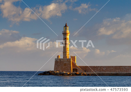 Chania. Lighthouse in the old harbor. 47573593
