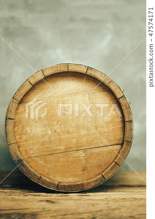 Wooden barrel and worn old table of wood. 47574171