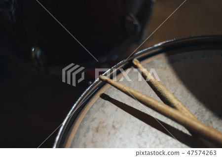 working drum with drum sticks working drum with drum sticks 47574263