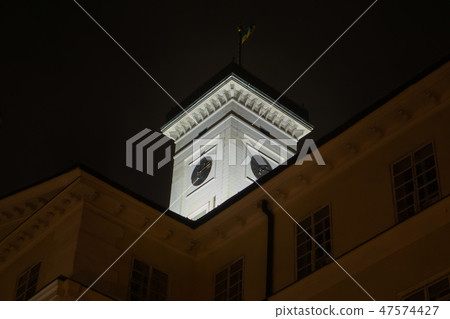 The tower of the city hall at night in the lights. Lviv. Ukraine. 2019.01.14 47574427