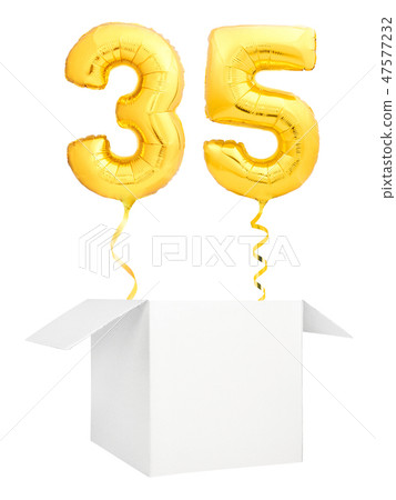 Golden number thirty five inflatable balloon with golden ribbon flying out of blank white box 47577232