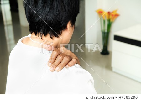 neck and shoulder pain, old woman suffering 47585296