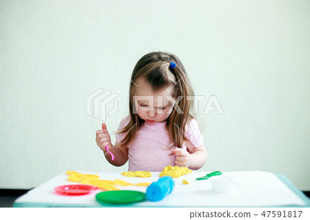 Children creativity. Kid sculpts from clay Children creativity. Kid sculpts from clay 47591817