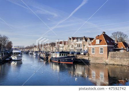 Historical houses and boats moored in Brielle Historical houses and boats moored in Brielle 47592742