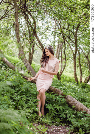 Healthy woman outdoors. Beauty girl female model 47595360
