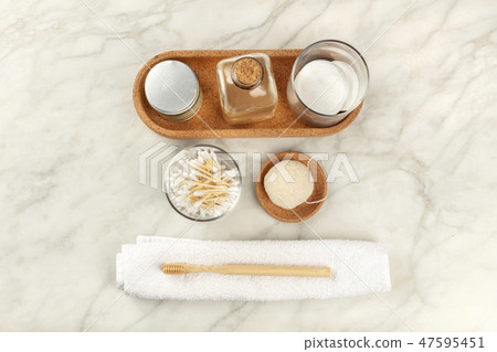 Homemade lotions, cotton pads, bamboo toothbrush, natural Konjac sponge, and bamboo cotton swabs Homemade lotions, cotton pads, bamboo toothbrush, natural Konjac sponge, and bamboo cotton swabs 47595451