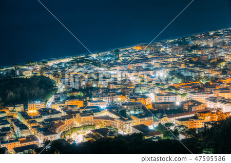 Terracina, Italy. Top Cityscape In Evening Night Illuminations Terracina, Italy. Top Cityscape In Evening Night Illuminations 47595586