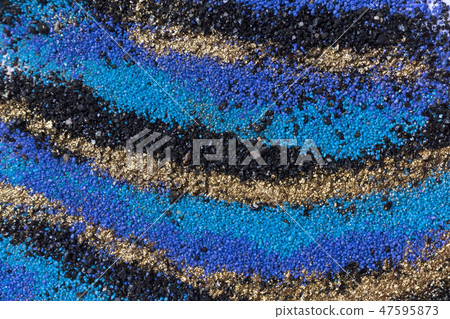 Layered colorful sand pattern. Marble style background. Blue and gold powder texture. Layered colorful sand pattern. Marble style background. Blue and gold powder texture. 47595873