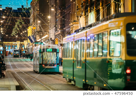 Helsinki, Finland. Tram Departs From Stop On Aleksanterinkatu Street. Night Evening Christmas Xmas Helsinki, Finland. Tram Departs From Stop On Aleksanterinkatu Street. Night Evening Christmas Xmas 47596450