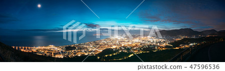 Terracina, Italy. Top View Skyline Cityscape City In Evening Night Illuminations. Panorama Terracina, Italy. Top View Skyline Cityscape City In Evening Night Illuminations. Panorama 47596536