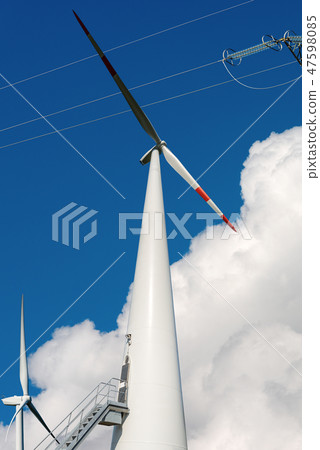 Wind Turbines and power line - Renewable energy Wind Turbines and power line - Renewable energy 47598085