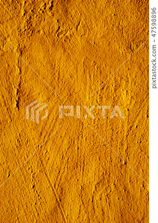 rustic orange plastered wall 47598896