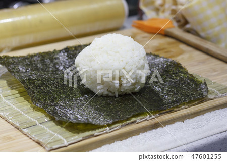 The process of making sushi and rolls The process of making sushi and rolls 47601255