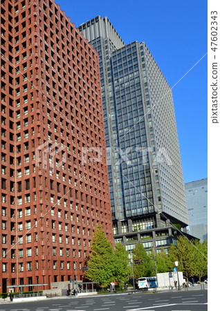 A photograph of a skyscraper near the Wada Kuramon crossing where the Rokuke Street and Hibiya Dori of Chiyoda Ward, Tokyo intersect 47602343