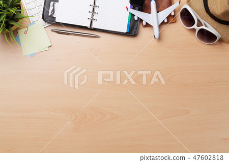 Business trip concept. Accessories on desk table 47602818