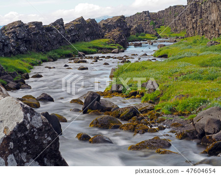 melted river in the Thingvellir national park in Mid-Atlantic Ridge melted river in the Thingvellir national park in Mid-Atlantic Ridge 47604654