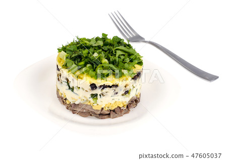 Portion salad with tongue on white plate Portion salad with tongue on white plate 47605037
