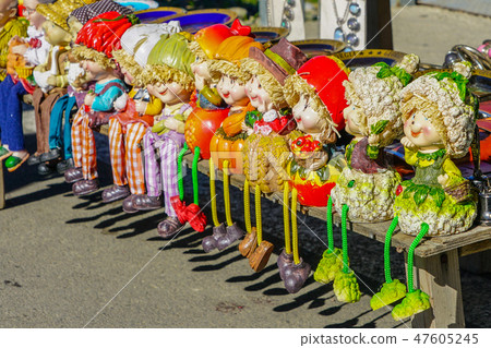 small colored home made dolls on the souvenir market for tourists small colored home made dolls on the souvenir market for tourists 47605245