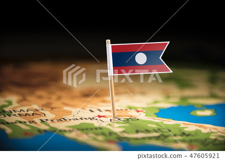 Laos marked with a flag on the map 47605921