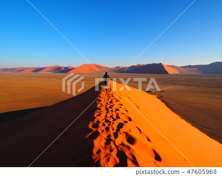 Walking along the Namib Desert ridgeline Walking along the Namib Desert ridgeline 47605968