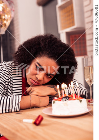 Cheerless afro American woman being all alone 47606081