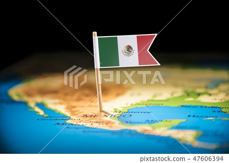 Mexico marked with a flag on the map 47606394