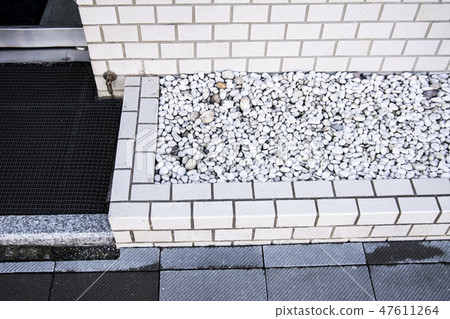 Jade gravel aside the entrance Jade gravel aside the entrance 47611264