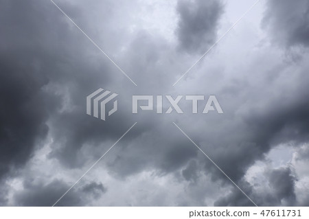 Rain clouds forming in the sky in concept of climate. Rain clouds forming in the sky in concept of climate. 47611731