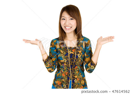 Southeast Asian woman showing something 47614562