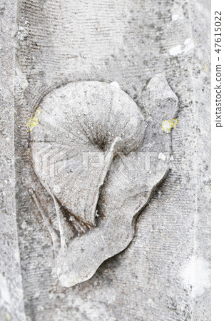 Snail carved in stone Snail carved in stone 47615022