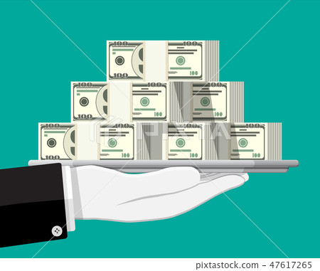 Stack of dollar banknotes on tray in hand. Stack of dollar banknotes on tray in hand. 47617265