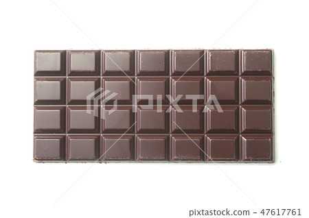 Closeup of milk chocolate bar on white background Closeup of milk chocolate bar on white background 47617761