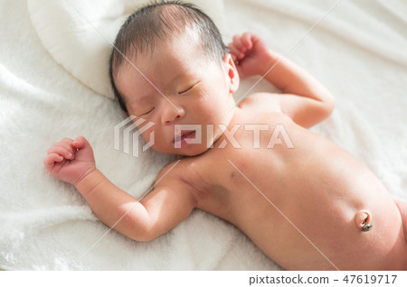 Newborn baby boy 47619717