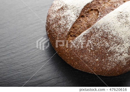 a loaf of black bread a loaf of black bread 47620616