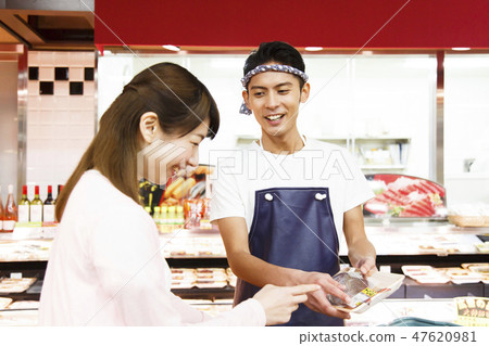 Fish store super shop clerk fresh fish shop customer 47620981