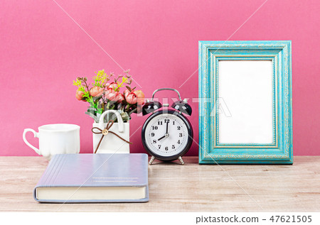 Blank photo frame on desk space. Blank photo frame on desk space. 47621505