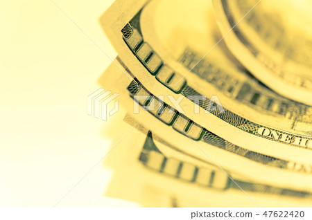 Close-up view of cash money american dollars. Finance and business concept.Shallow depth of field. 47622420