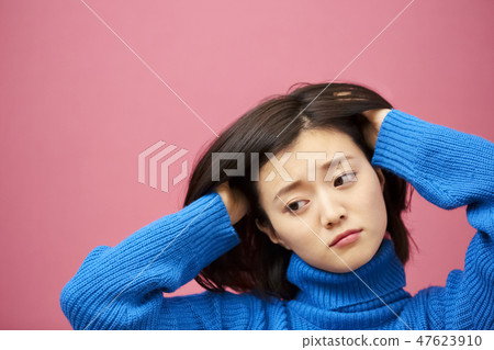 Thinking woman's portrait 47623910