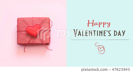 Happy Valentine's day card with red gift on blue. 47623943