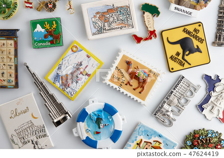 Magnet souvenirs on white refrigerator Magnet souvenirs on white refrigerator 47624419