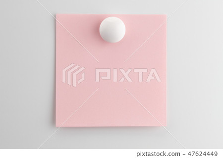 Square blank sheet of pink paper pinned 47624449