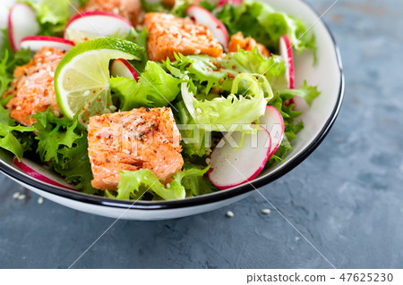 Healthy lunch salad with baked salmon fish Healthy lunch salad with baked salmon fish 47625230