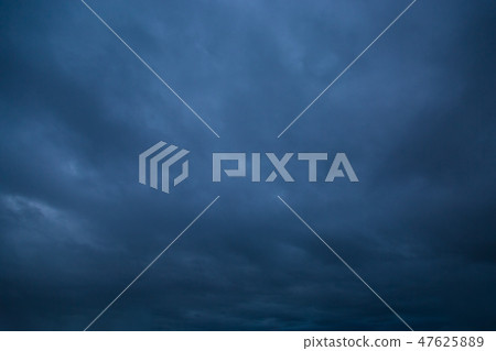 Dark stormy sky. Gloomy clouds. Overcast weather 47625889