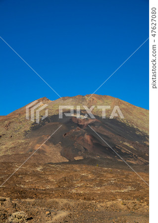 Closeup of Pico Viejo volcano crater against blue sky Closeup of Pico Viejo volcano crater against blue sky 47627080
