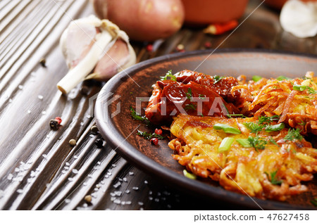 Closeup view at Homemade tasty potato pancakes 47627458