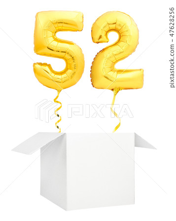 Golden number fifty two inflatable balloon with golden ribbon flying out of blank white box isolated 47628256