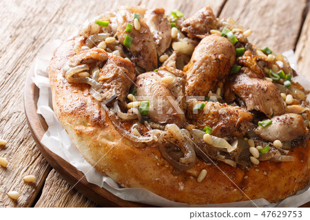 Palestinian chicken with sumac and onions Palestinian chicken with sumac and onions 47629753