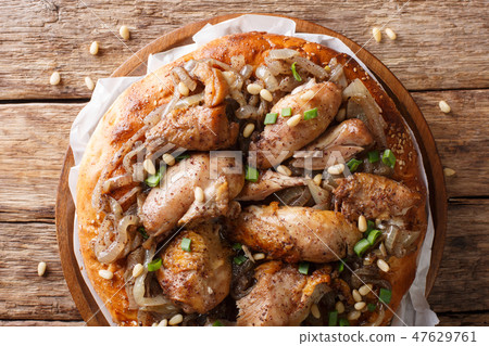 Chicken with sumac and onions with flat bread Chicken with sumac and onions with flat bread 47629761