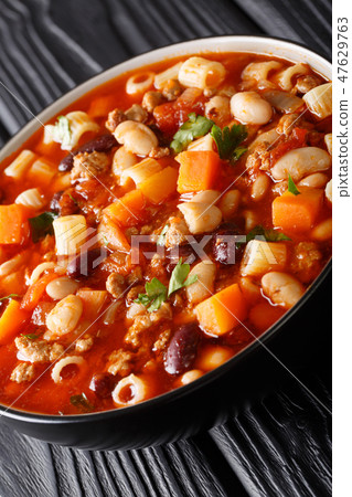 Pasta fagioli soup close-up in a bowl. vertical 47629763